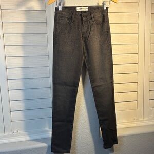 Etienne Marcel black jeans with black embellishments on front in ombre pattern